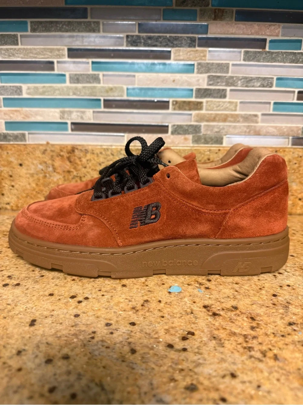 New Balance unisex Suede Sneaker in Rust Orange with Gum Sole
